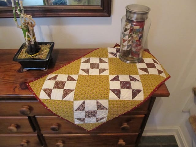Small quilt on table