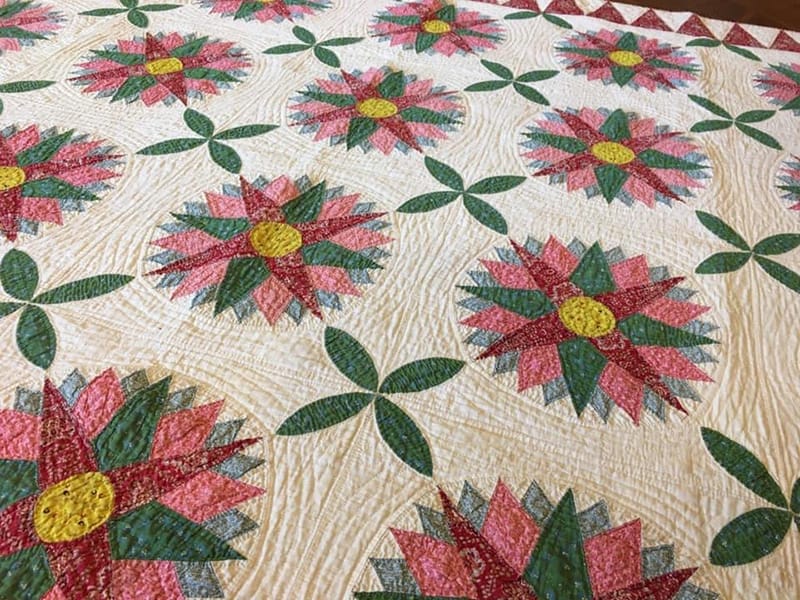 Detail of mid-19th century mariner's compass quilt