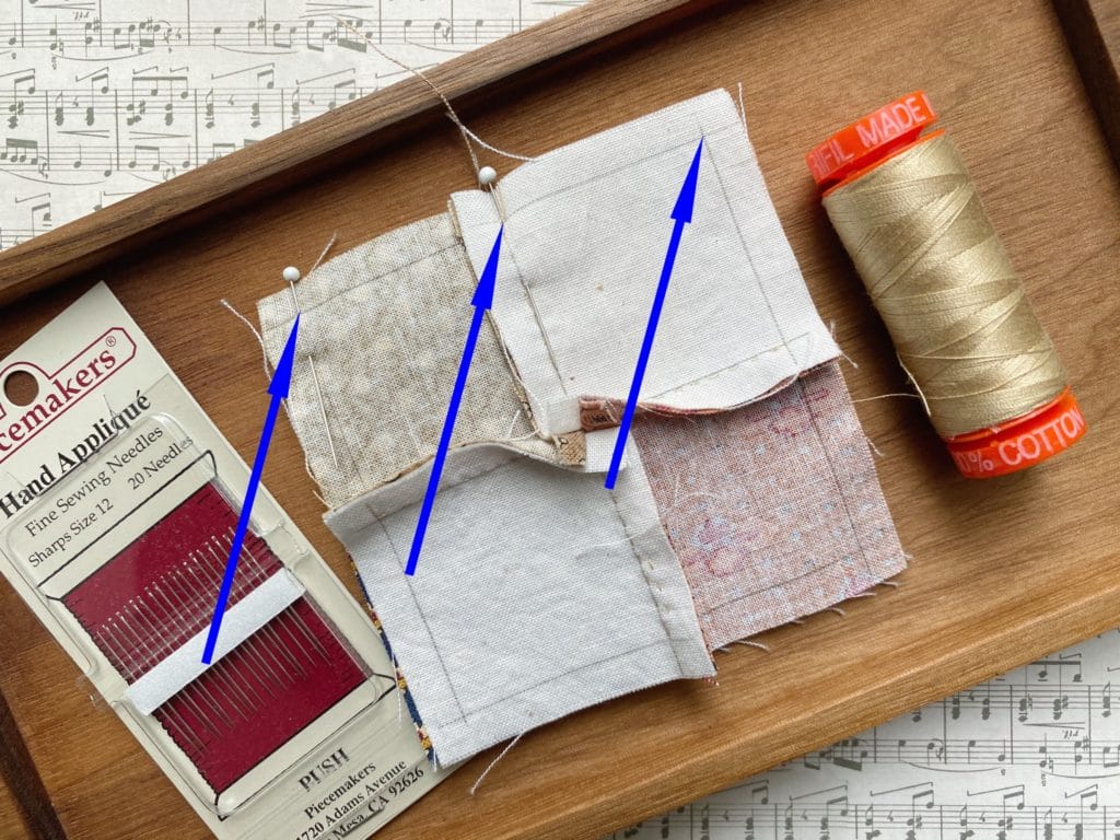 Align fabric pieces by pinning at each corner.
